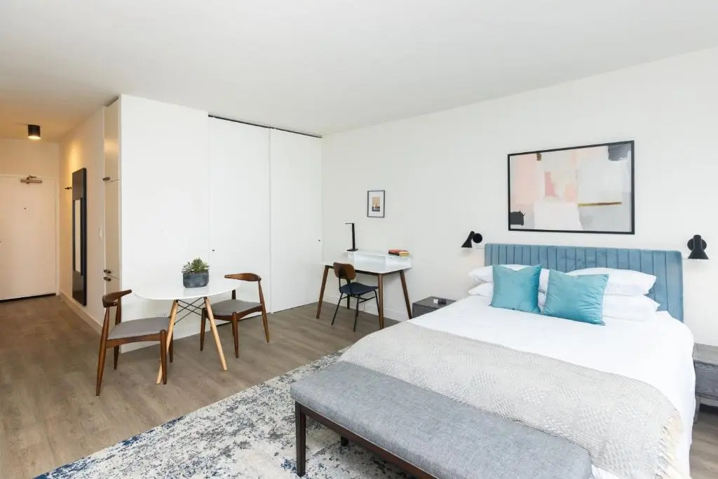 photo 1 of 21 East - Chic DT Apts with Rooftop by Zencity