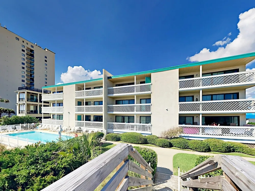 photo 1 of Beachfront W/ Pool: 1 Block To Main Street 3 Bedroom Condo