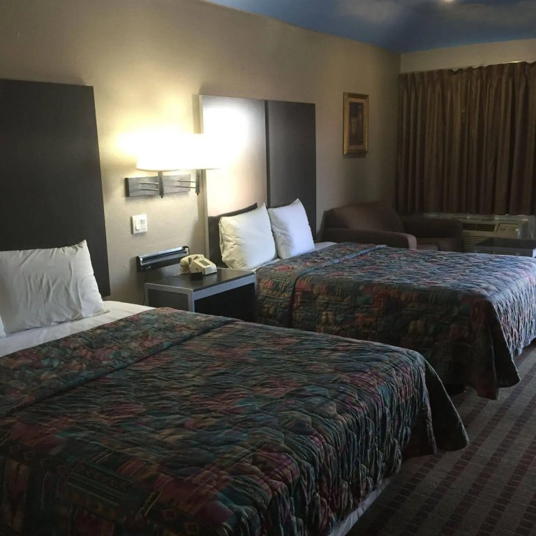 photo 1 of Camelot Inn & Suites Hobby/Gulf Freeway