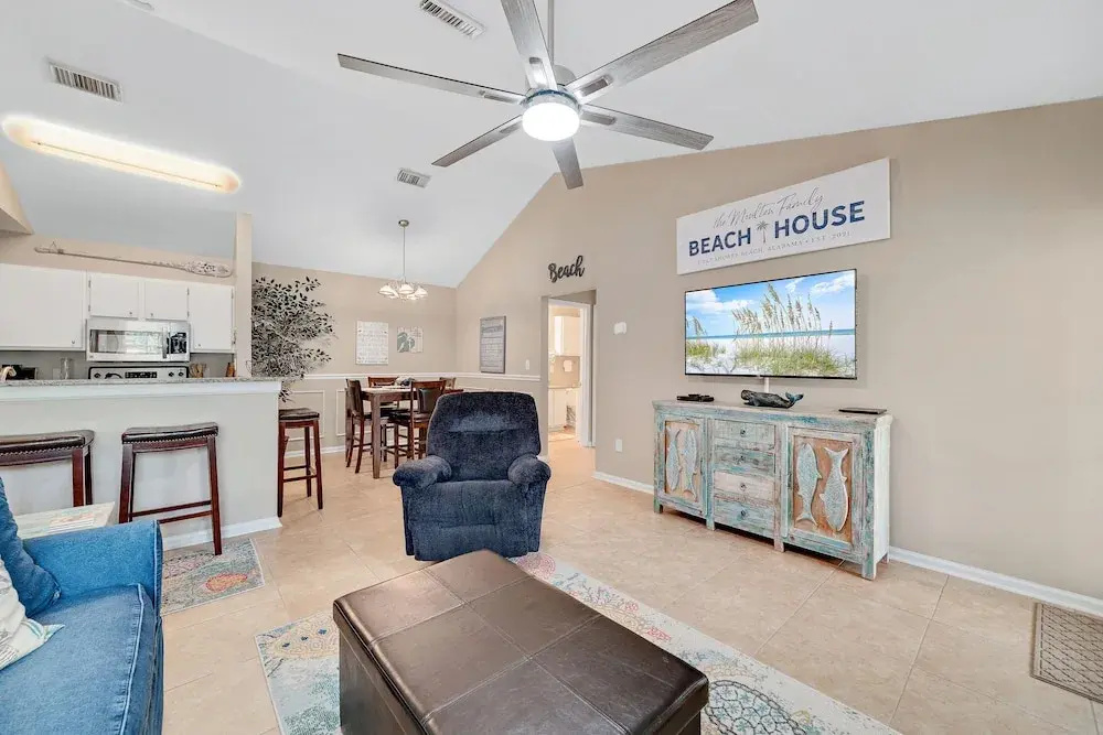 photo 1 of Charming Condo With Luxe Amenities Less Than 10 Minutes From the Beach