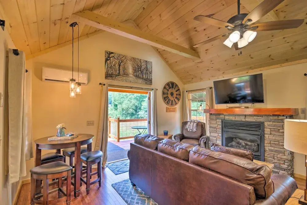 photo 1 of Deck & Hot Tub: Bryson City Riverfront Cabin!