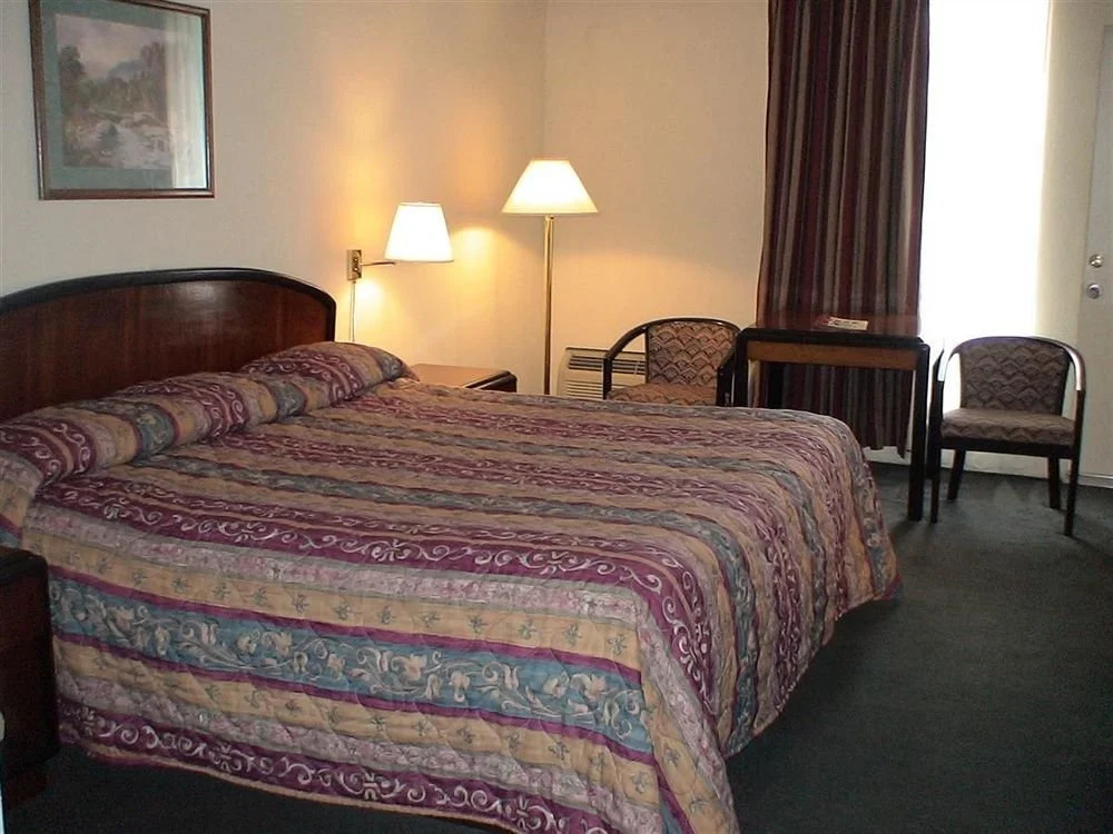photo 1 of Greenway Inn  Suites