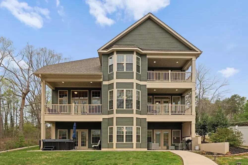 photo 1 of Sleeps 22, Lakefront w/ Private Dock & Pool, 2 Houses Lake Living by Avantstay