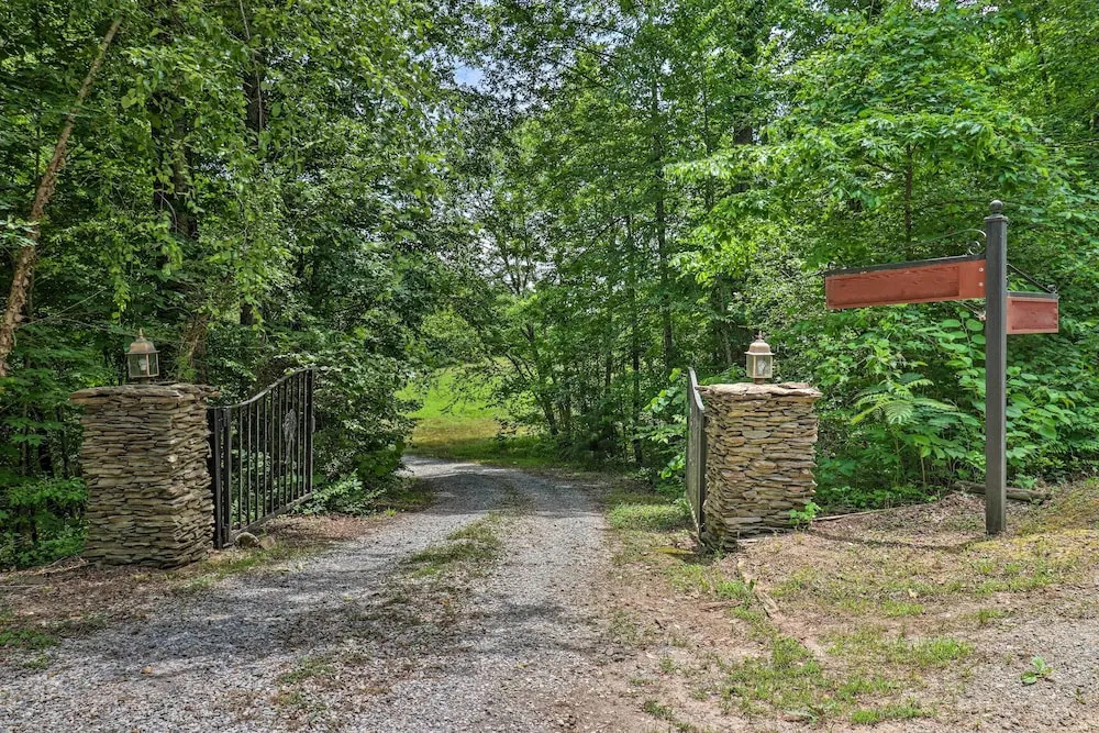 photo 1 of Beautiful Riverfront Lake Lure Lodge on 13 Acres