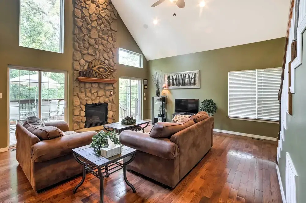 photo 1 of Hot Tub & Wooded Views: Lakefront Blue Eye Cottage