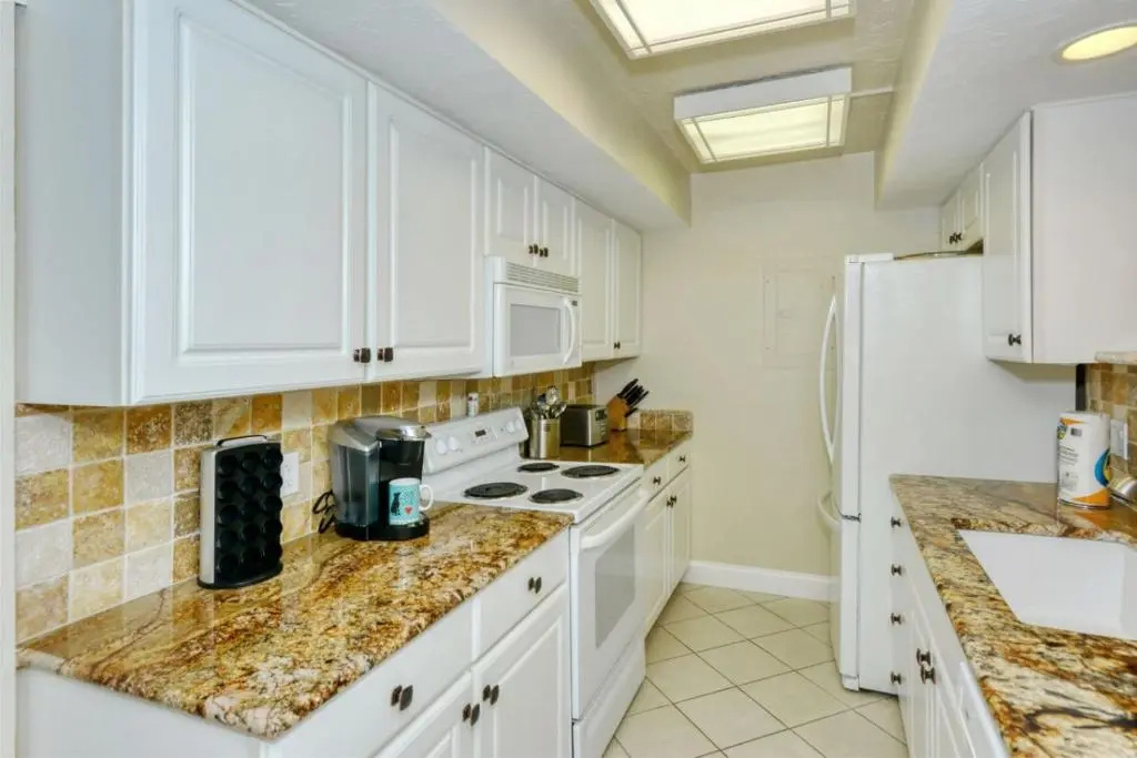 photo 1 of LaPlaya 202D Picture this from your lanai or sundeck Palm trees beach turquoise water and gorgeous sunsets