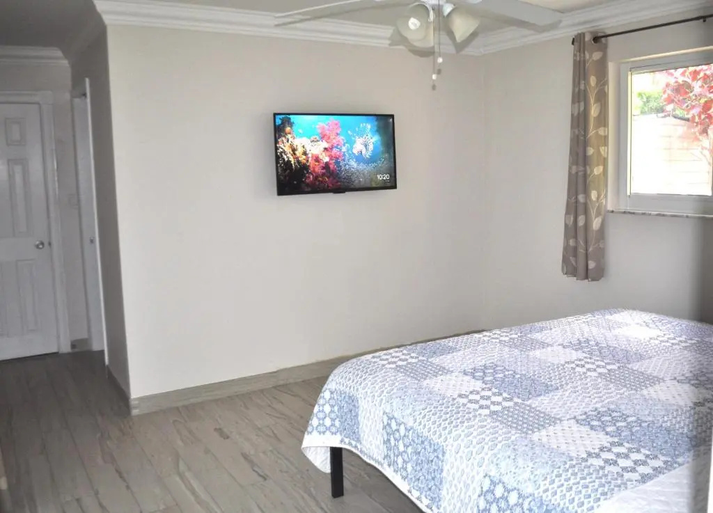 photo 1 of Lovely 3-bd, walk to bars, 9 min drive from beach! Heated pool.