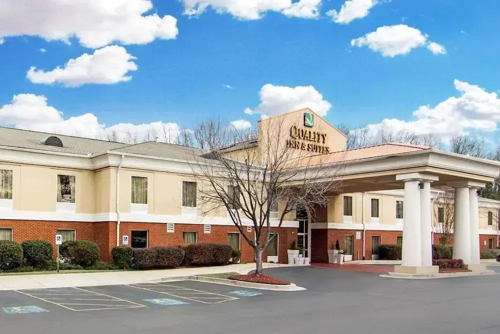 photo 1 of Magnolia Inn & Suites