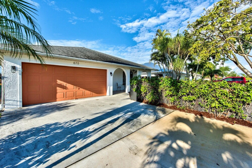 photo 1 of Milano Vacation Rental: Newly Renovated 3-BR Home with Private Pool, Hot Tub, and Pet-Friendly Front Yard. Minutes from Vanderbilt Beach