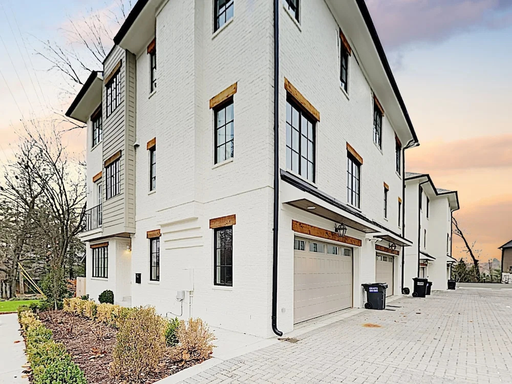 photo 1 of New Listing! Stylish All-suite End Unit W/ Garage 3 Bedroom Townhouse
