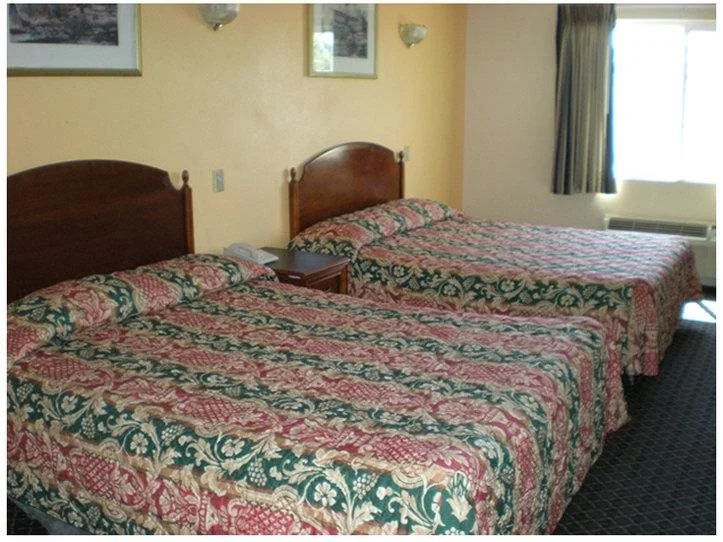 photo 1 of Heritage Inn & Suites