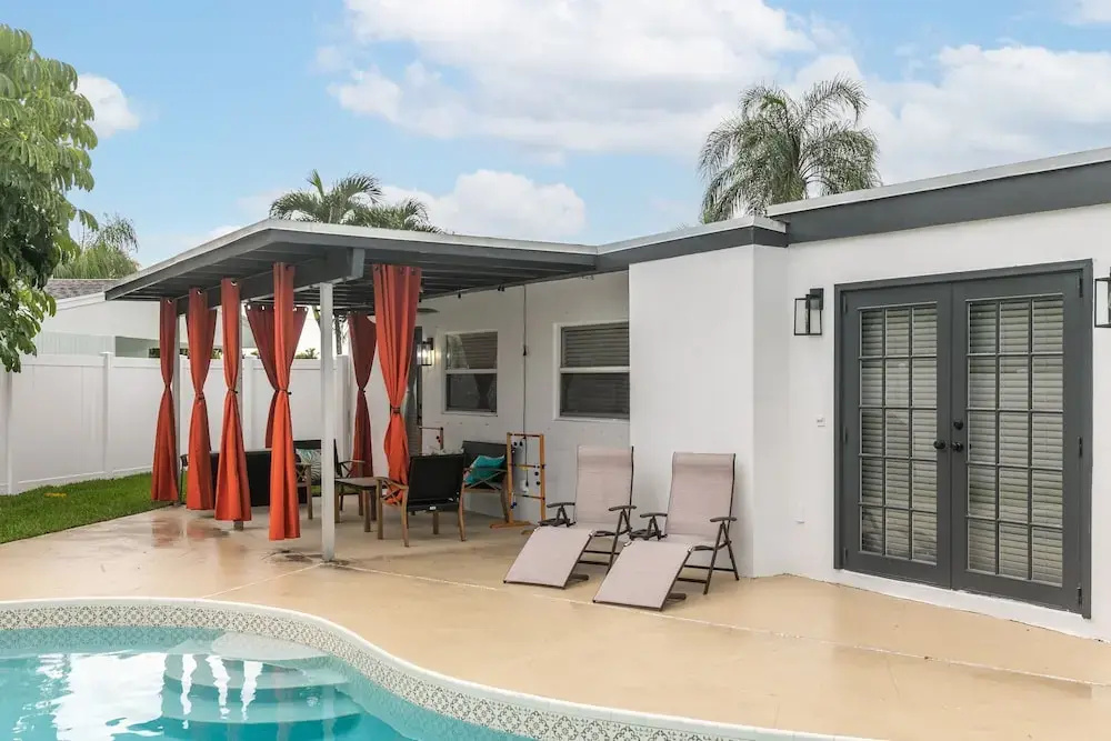photo 1 of Palm Beach Bliss W/ Pool L Large Backyard L Grill 3 Bedroom Home by RedAwning