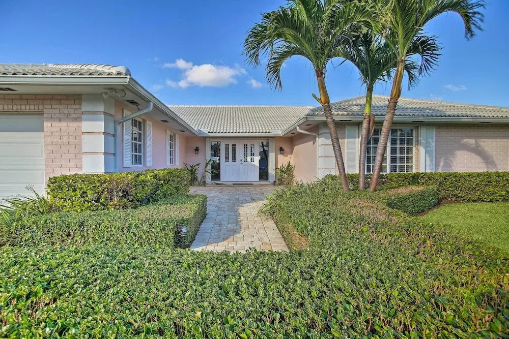 photo 1 of Riviera Beach Home w/ Pool - Walk to Beaches!