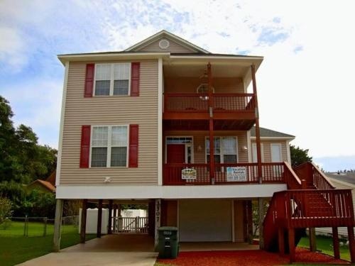 photo 1 of Sea What Happens 4 Br home by RedAwning