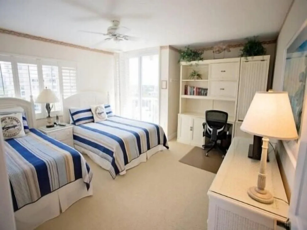 photo 1 of Cozy Condo with Gorgeous View of the Beach and Gulf by RedAwning