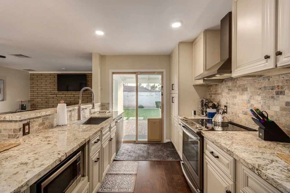 photo 1 of Showstopper!  3/2 With Sparkling Pool! Heart Of Phoenix! Sleeps 9! 3 Bedroom Home by Redawning
