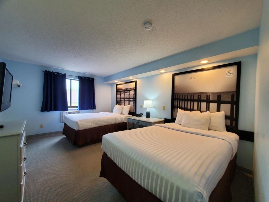 photo 1 of Coastal Inn & Suites - Wilmington, NC