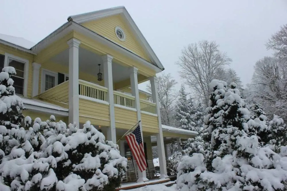 photo 1 of The Yellow House on Plott Creek Road