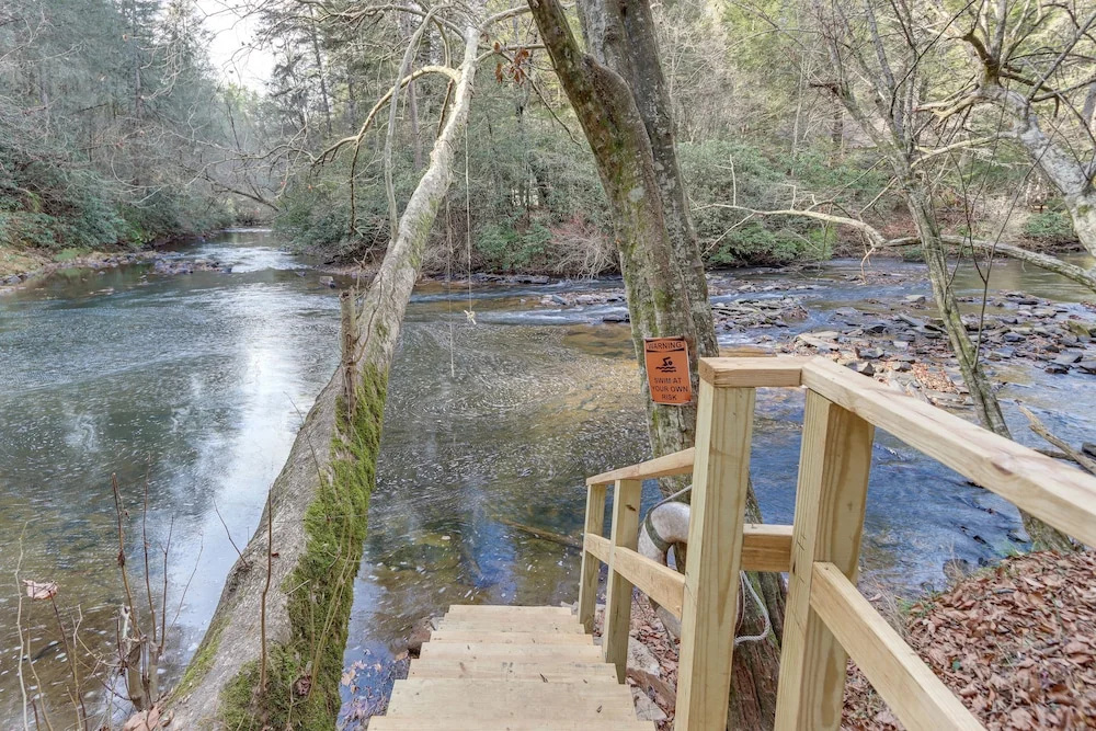 photo 1 of Waterfront Cabin w/ Beautiful River View & Hot Tub
