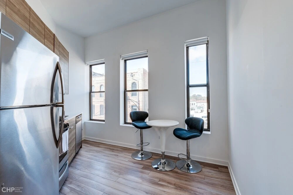 photo 1 of Wind Down After A Long Day In The Windy City - Full Kitchen, Spa Bath, Comfy Bed - 747 Lofts Cabin 202 by RedAwning