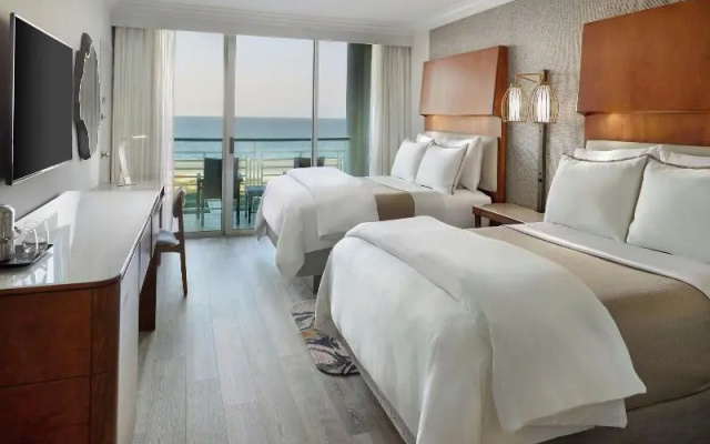 Quadruple room with balcony and oceanfront