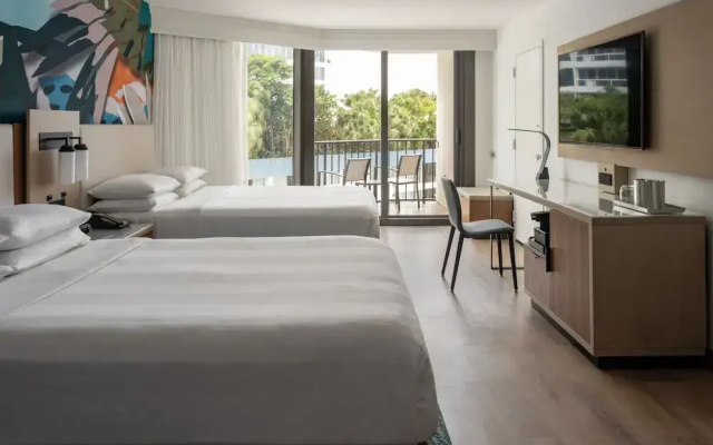 Quadruple room with balcony and with pool view