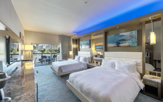Deluxe Quadruple room with balcony