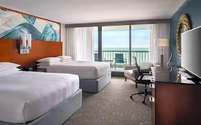 Deluxe Quadruple room with partial ocean view
