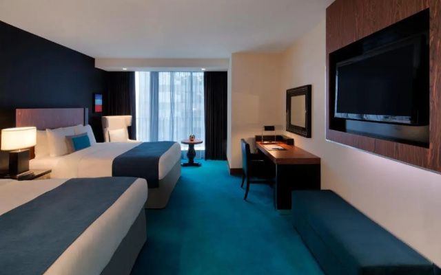 Standard Quadruple room with balcony and with city view