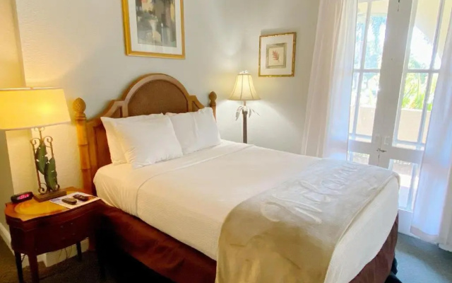 Standard Quadruple room with garden view