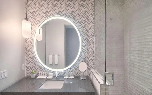 Deluxe Quadruple room with balcony