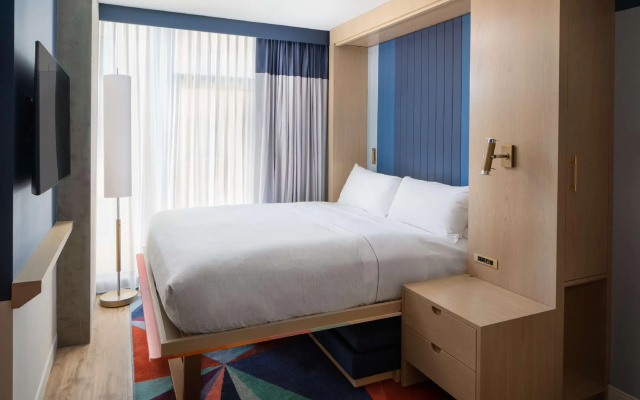 Flex Room with Wall Bed Hearing Accessible Double room