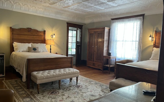 Standard Quadruple room with garden view