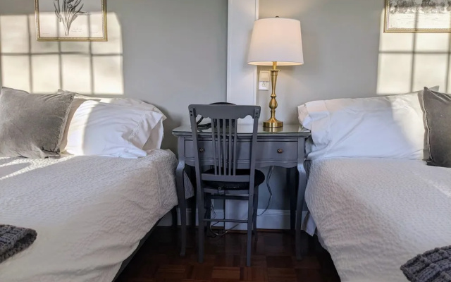 Premium Quadruple room with balcony and with garden view