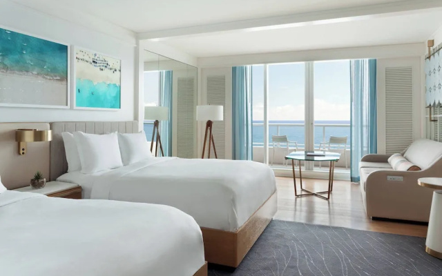 Quadruple room with balcony and oceanfront