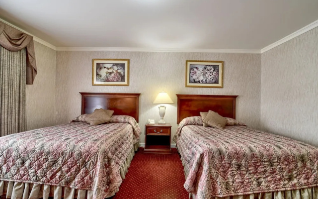 Deluxe Quadruple room with balcony