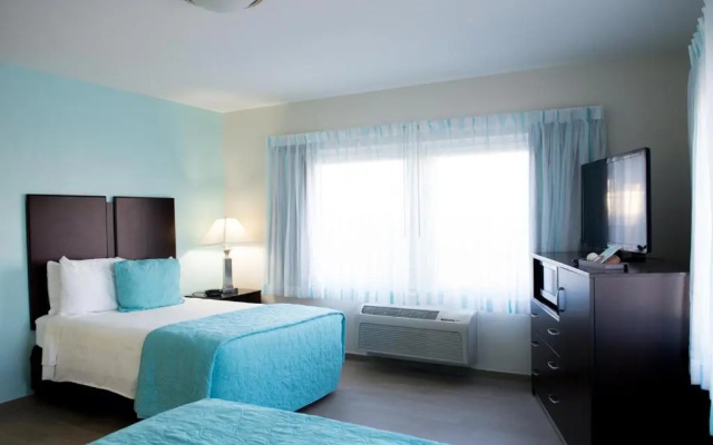 Standard Quadruple room with partial ocean view