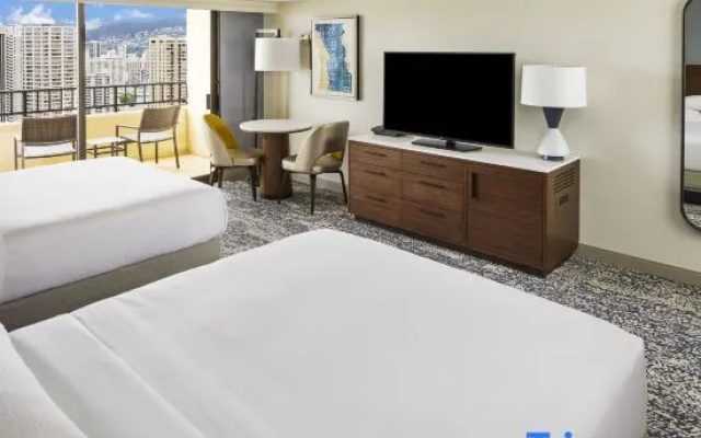 Tapa Collection room with partial ocean view