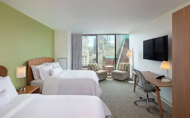 Deluxe Quadruple room with city view