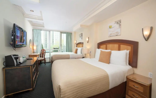 Deluxe Quadruple room with balcony