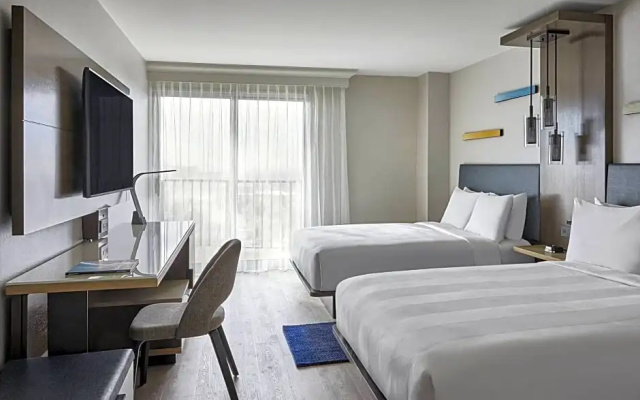 Quadruple Guest room with balcony and with pool view