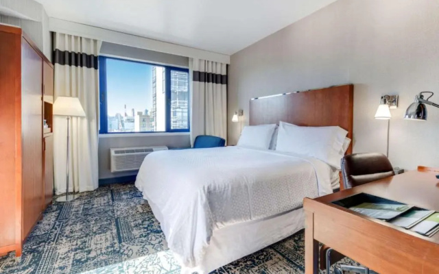 Double room with balcony and with Manhattan view