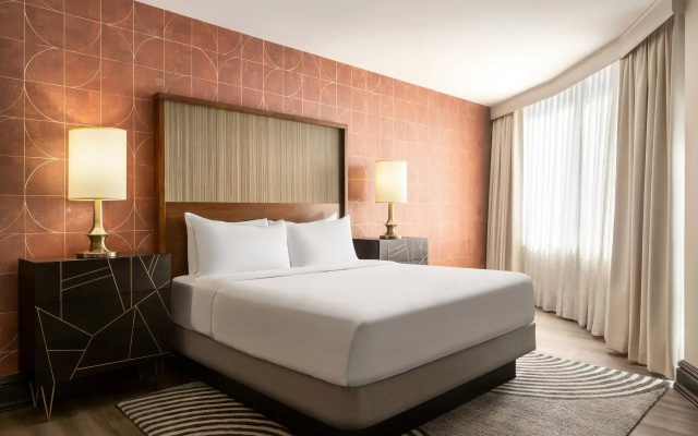 Double Junior Suite with balcony and with pool view
