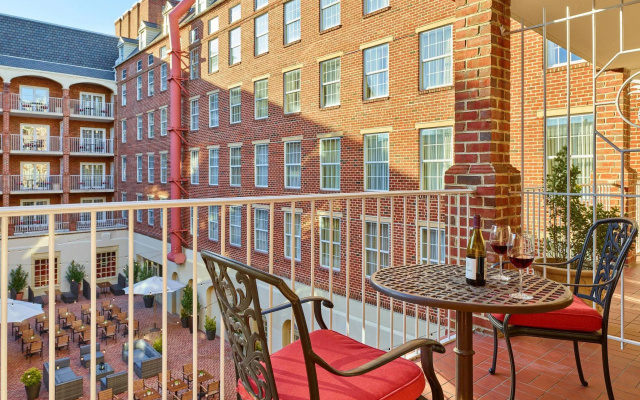Suite with balcony and with courtyard view