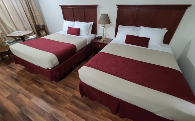 Deluxe Quadruple room with balcony