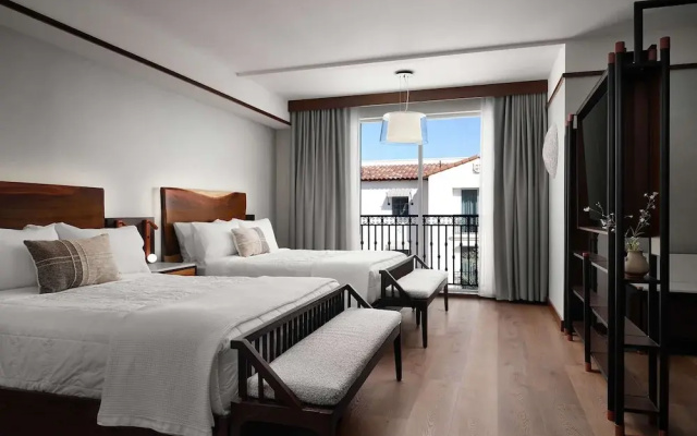 Standard Quadruple room with courtyard view