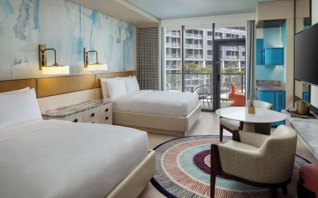 Quadruple room with balcony and with pool view