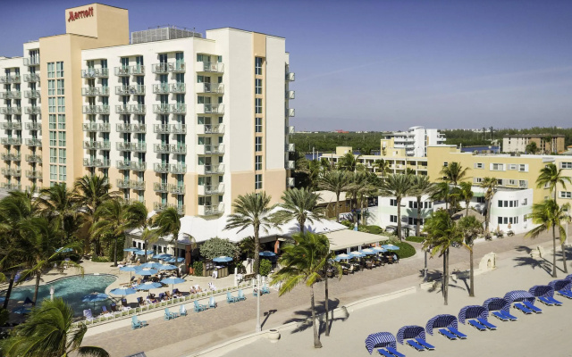 Standard Quadruple room with balcony and with partial sea view