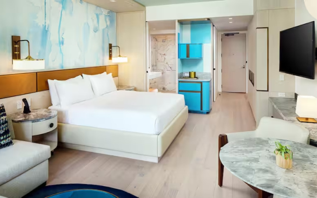 Room with balcony and with pool view