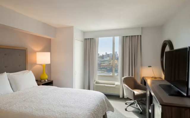 With Small Fridge room with city view